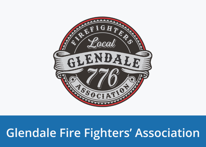 Circle logo with main color dark grey and accented in silver/light grey. A ribbon across the center with text "Glendale" and additional text in the circle "Local 776, Firefighters Association". Blue banner at Bottom with white text "Glendale Fire Fighters Association"